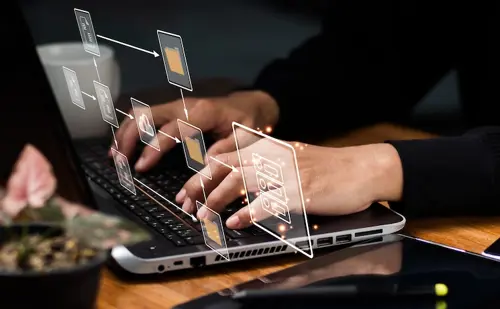 man using a computer to view the steps of his file migration